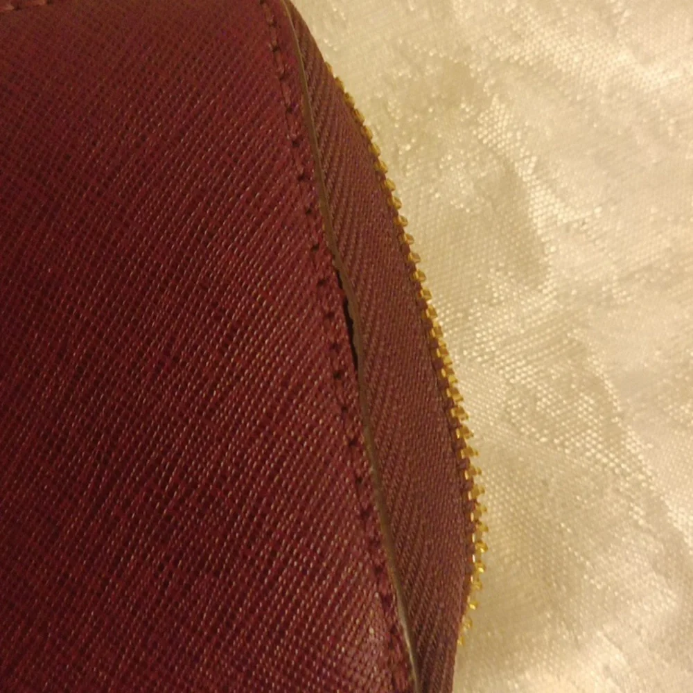 Michael Kors large Saffiano burgundy color leather accordion wallet/ wri…